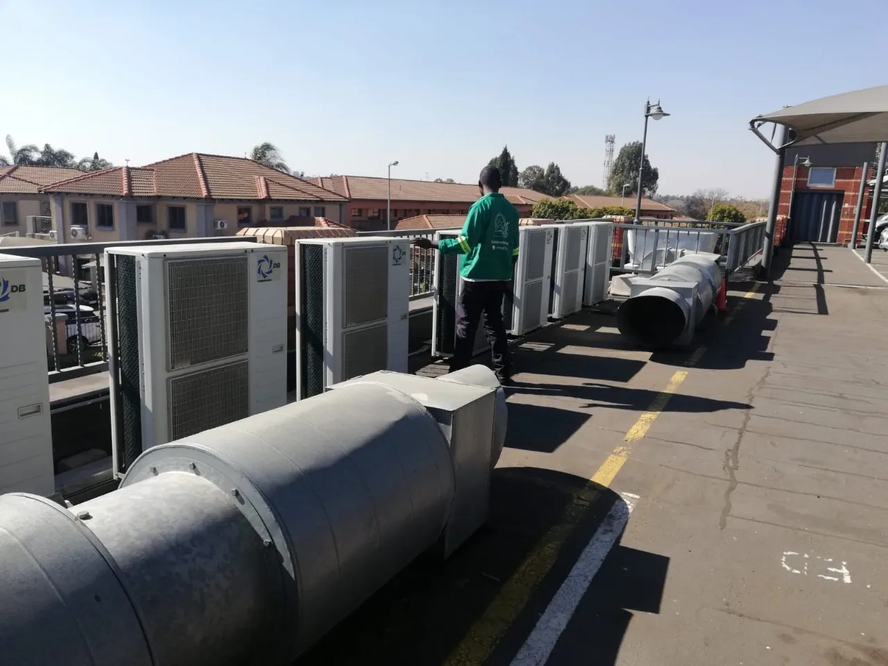 HVAC equipment and duct installation on a commercial rooftop