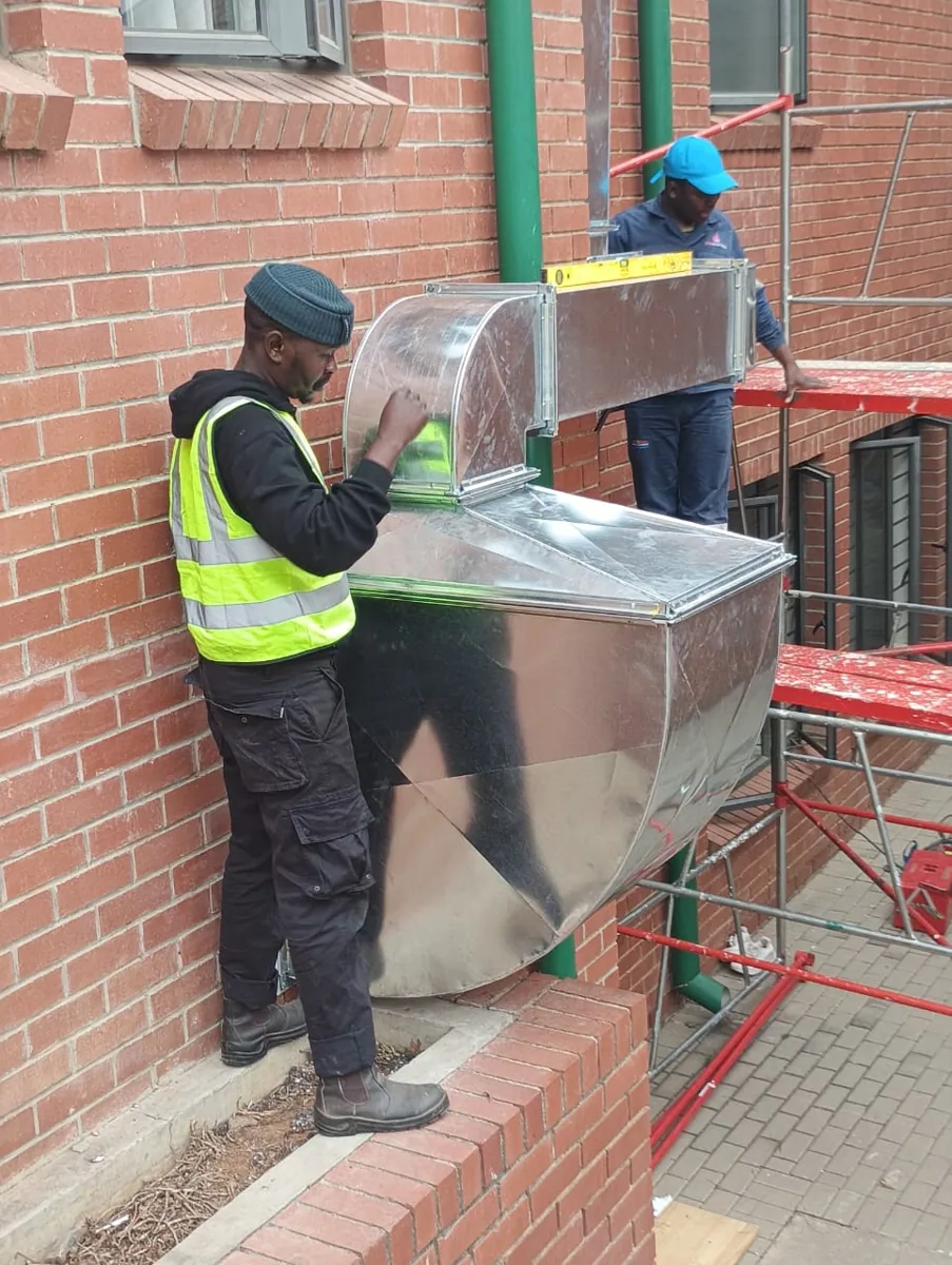 Technician at air conditioning project